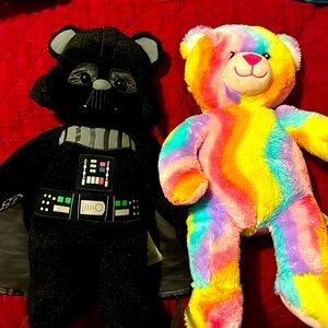 Two builder bears.one is rainbow bear and other Darth Vader.